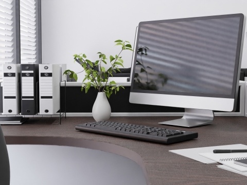 MACが置かれたデスクの写真